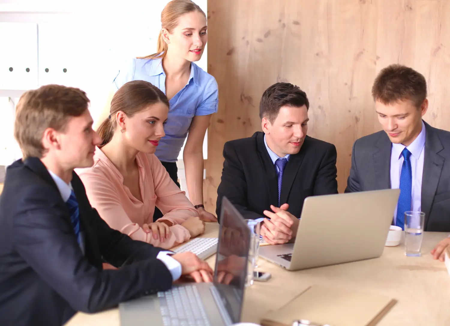 Business meeting - manager discussing work with his colleagues.